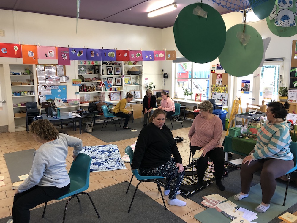Preschool educators in a whole school workshop practising with The Karma Classroom Activity Cards